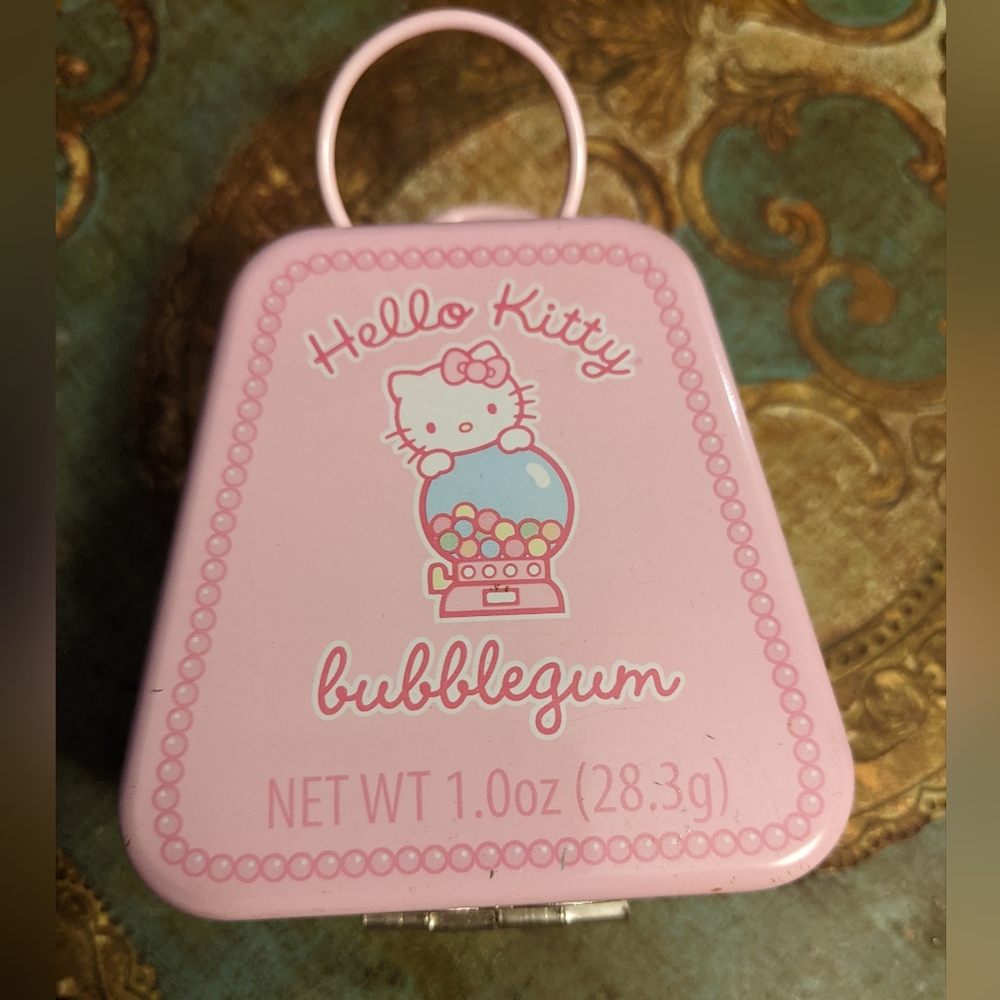 Adorable Hello Kitty: Candy Tin - Bubblegum Pink purse shaped tin with hinge